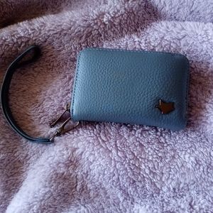 Blue wallet with a hand lanyard